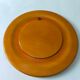 Round top in carved wood and vintage varnish