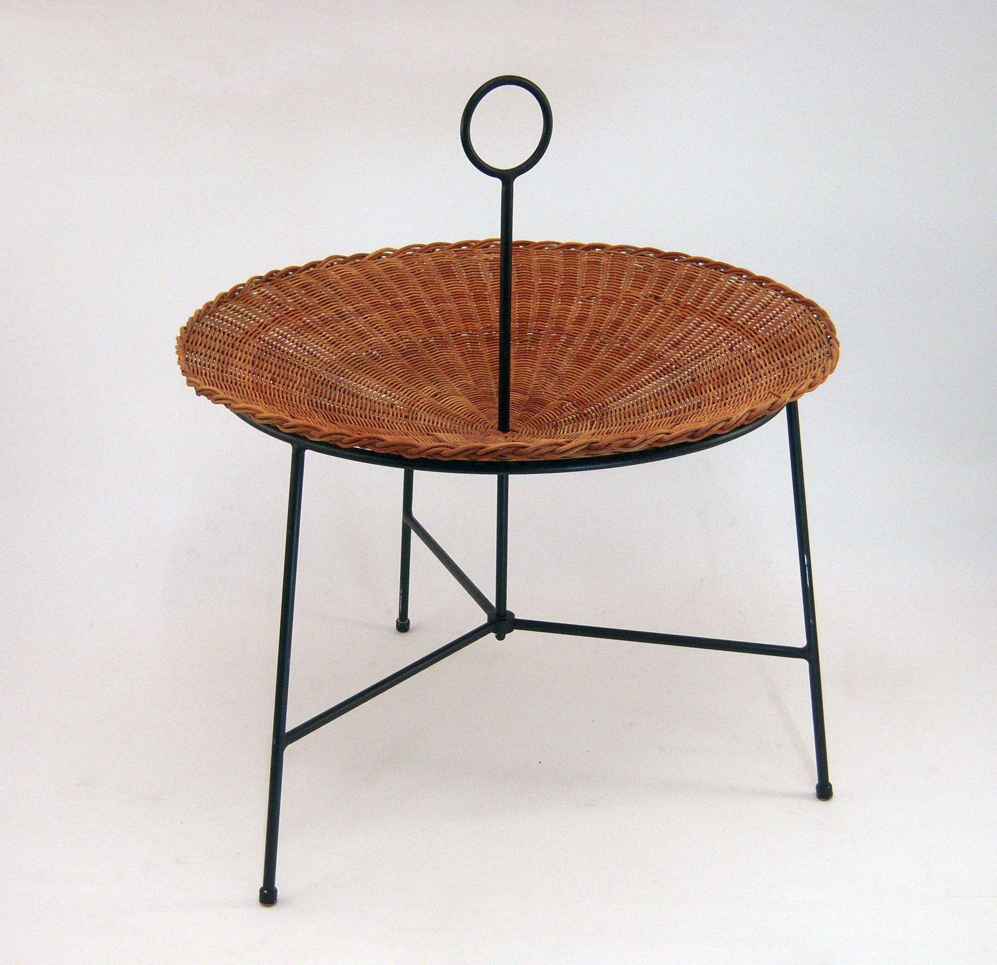 Wicker and black lacquered brass magazine rack 1960
