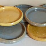 Seven vintage potter's sweet treat plates