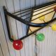 Vintage wall coat holder with 4 coloured balls, mirror and shelf