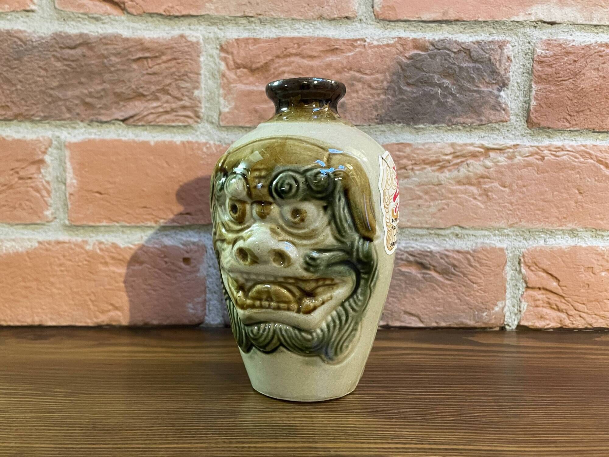 Japanese Awamori Bottle by the Helios Distillery (Okinawa) with Raised Lion and Dragon Design