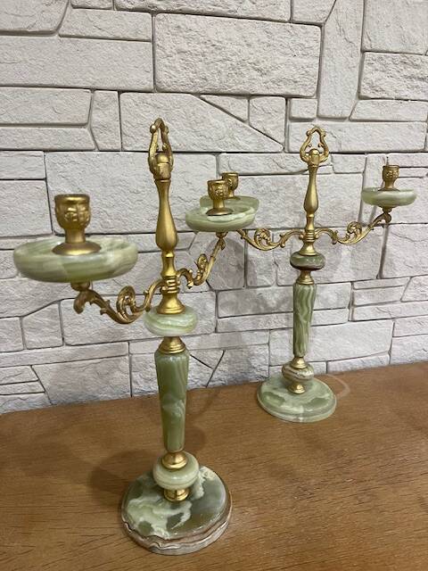Pair of onyx and brass candlesticks