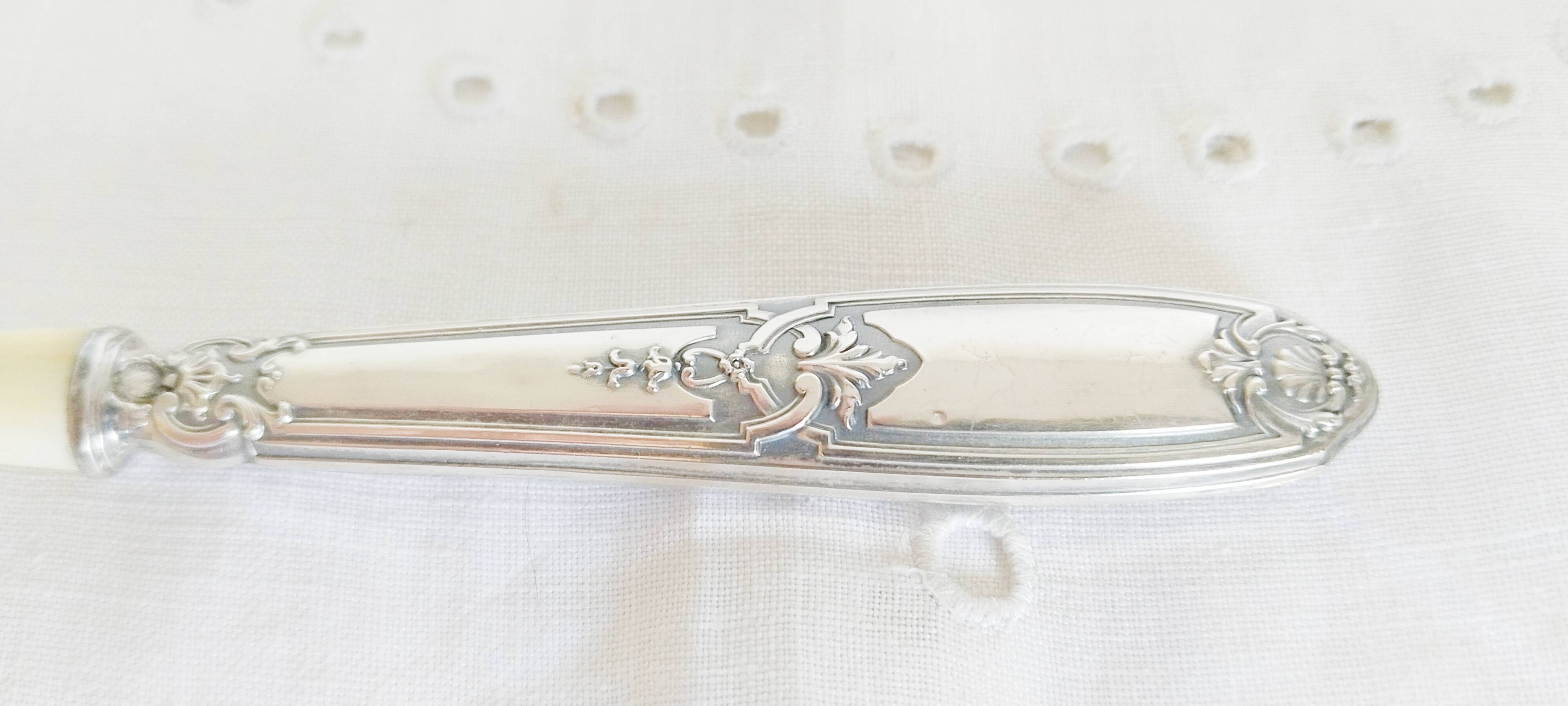 Silver and "horn" porridge spoon