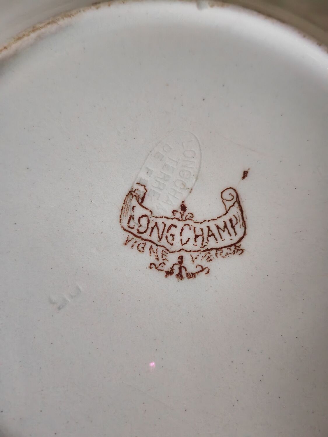 Lonchamp iron earth plate