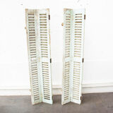Pair of shutters louvered