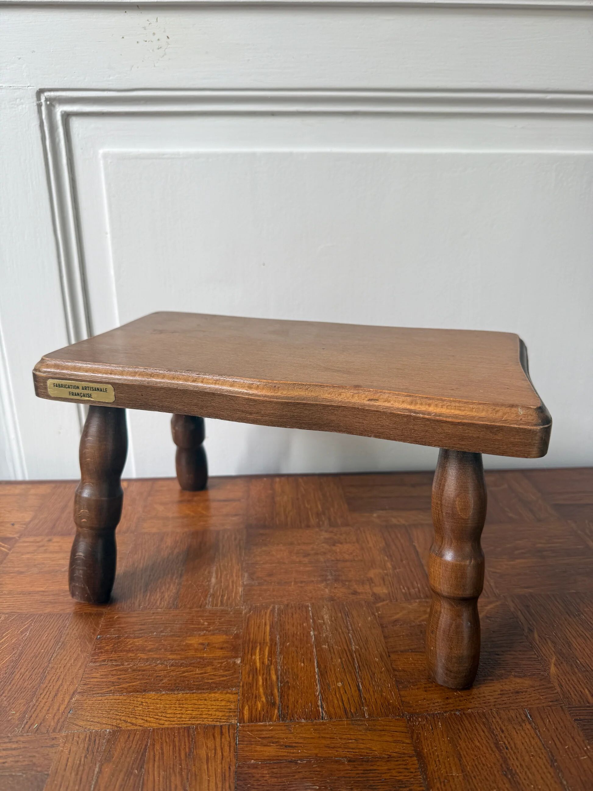 Old wooden milking stool