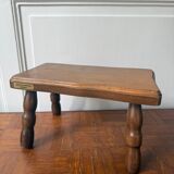 Old wooden milking stool