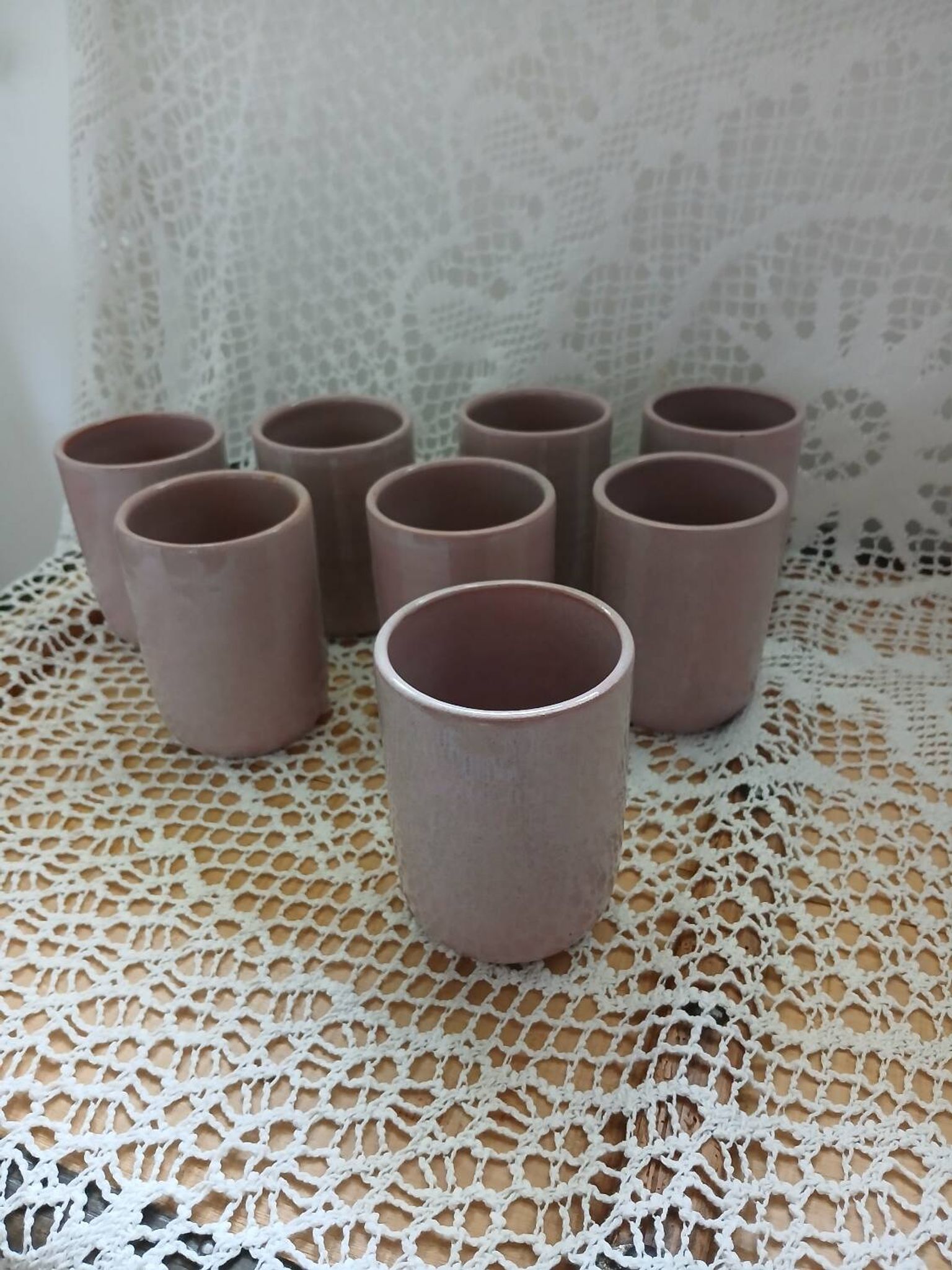 8 signed enamelled ceramic mugs
