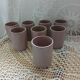 8 mugs en céramique émaillée signés