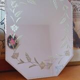 Beveled mirror with floral decor