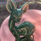 Pair of Art Deco deer by Charles Lemanceau in red and green ceramic.