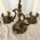 Pair of antique bronze candlesticks at the end of the table XIXth