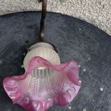 Metal wall lamp with frosted glass shade in the shape of a pink corolla