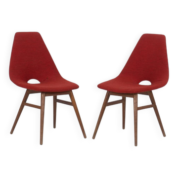 Wooden chairs with burgundy fabric, around 1950.
