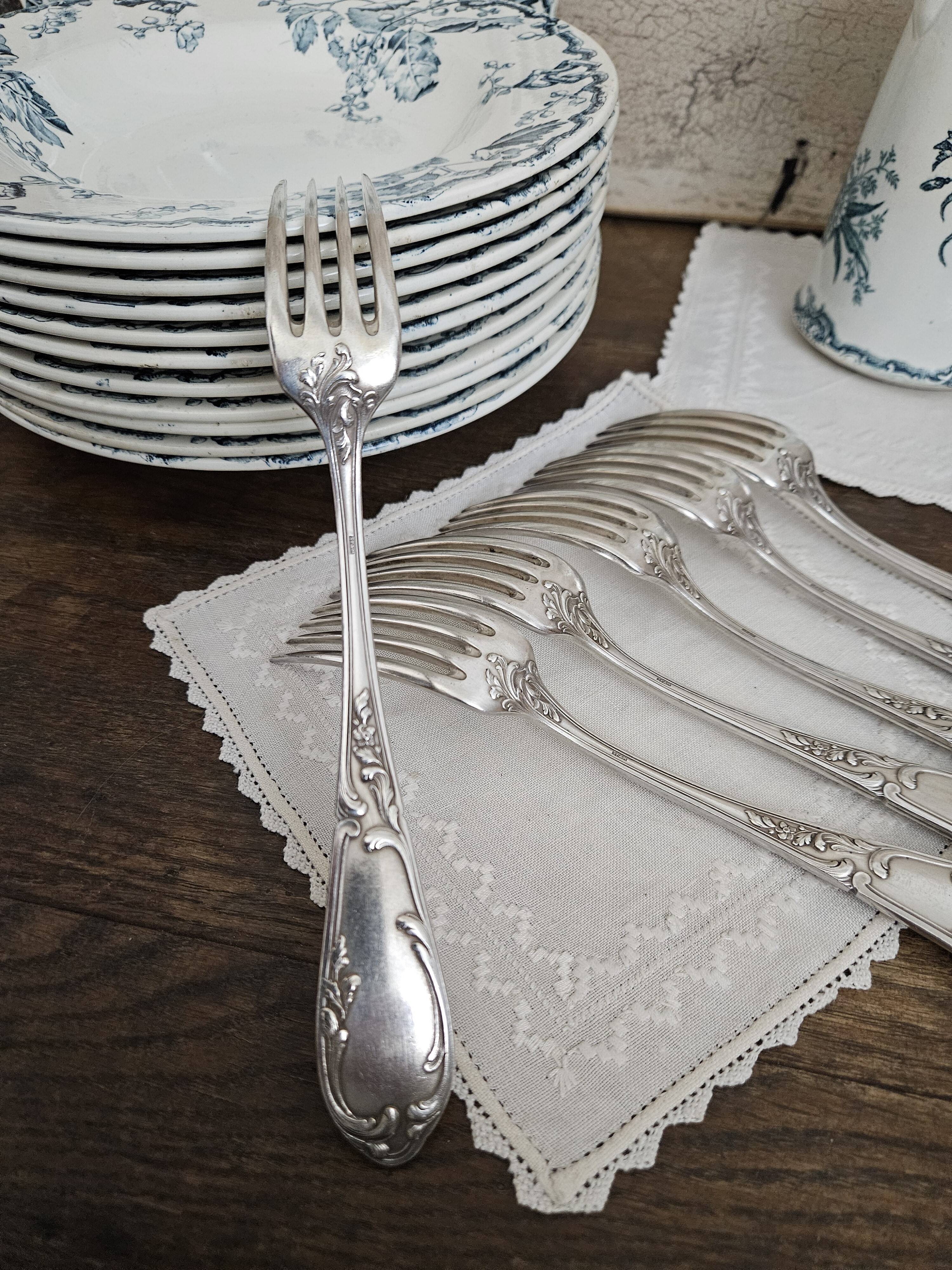 6 silver metal forks