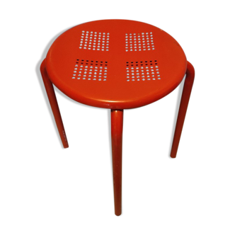 Red patinated metal stool