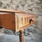 Antique French walnut table with six drawers, parquet top, early 20th century.