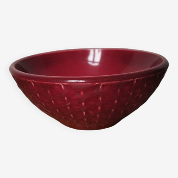 Burgundy red slip ceramic bowl with vintage braided pattern