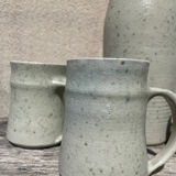 Set in stoneware cups and pitcher
