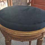 Golden wooden piano stool