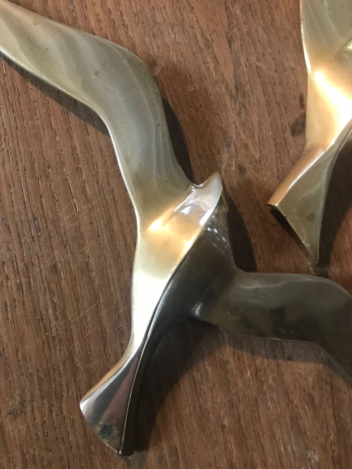 Pair of brass swallows