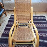 Rocking chair in arched wood and cane
