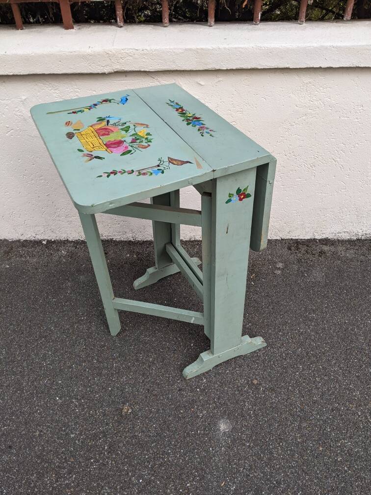 Antique Scandinavian table with bohemian country decor and hand-painted decor