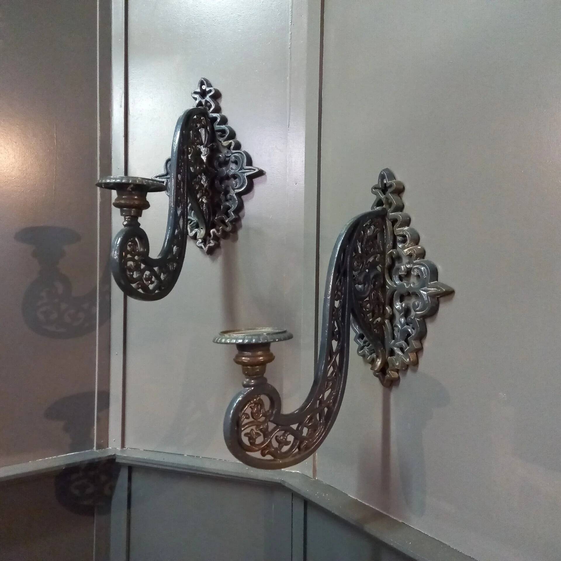 Set of antique neo-Gothic cast iron wall sconces