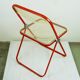 Red Plia Lucite folding chair by G. Piretti for Castelli Italy