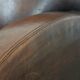 Beautifully shaped vintage sheepskin armchair with character