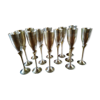 13 Brass Champagne Flutes and Silver Metal