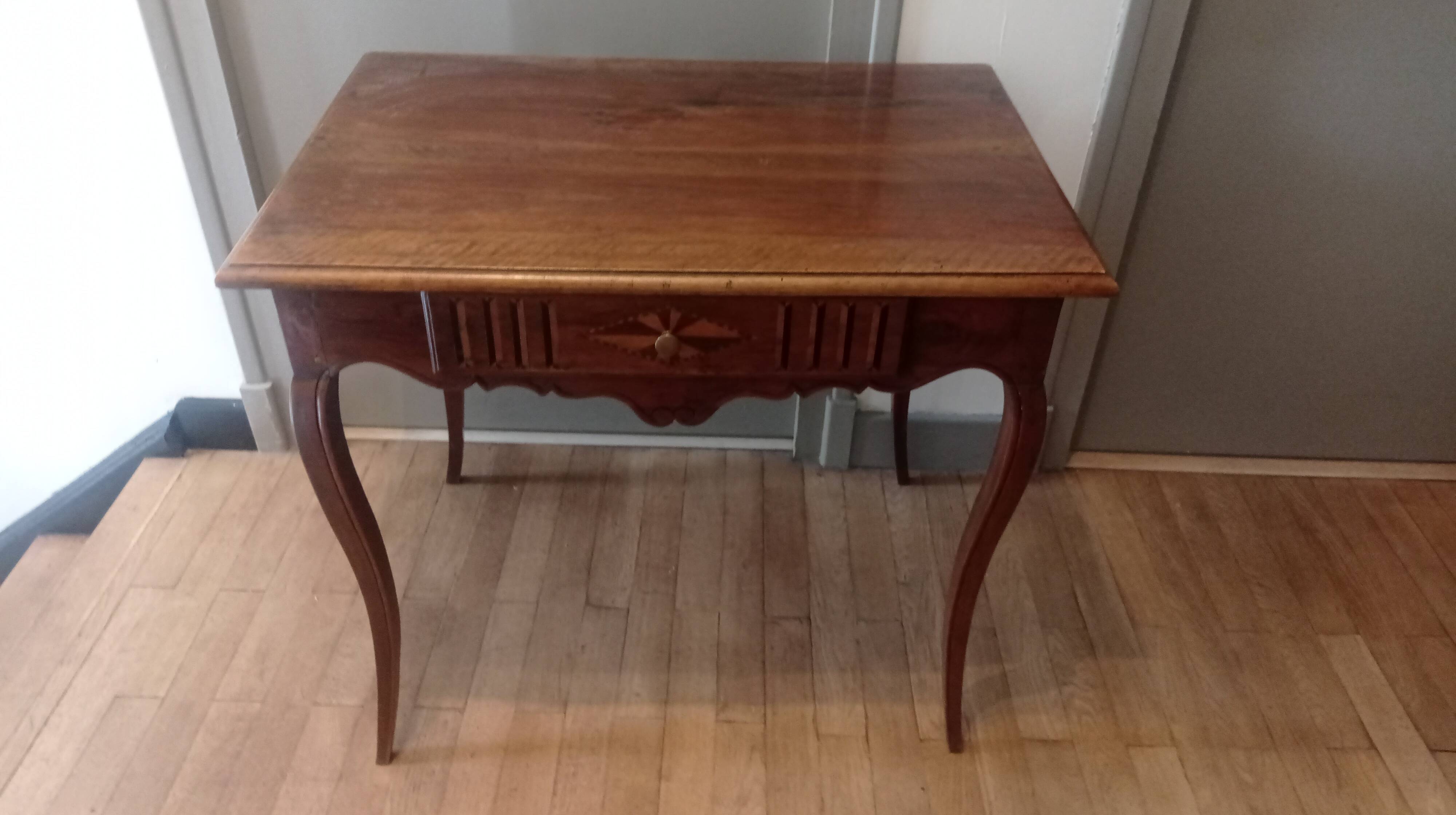 Walnut and marquetry table, 19th century.