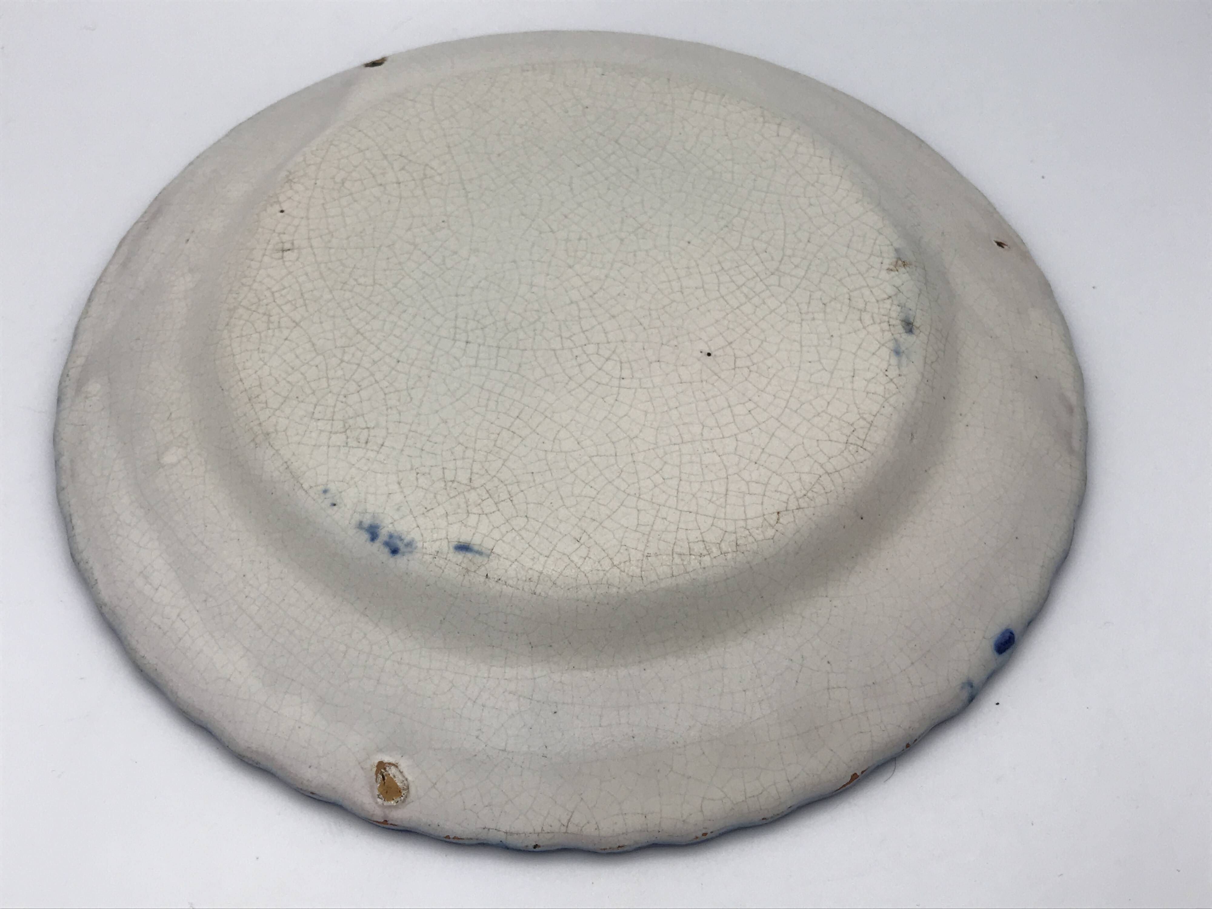 Antique auvillar earthenware plate decorated with basket of polychrome flowers