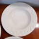 Set of 6 white ceramic deep plates made in Italy.