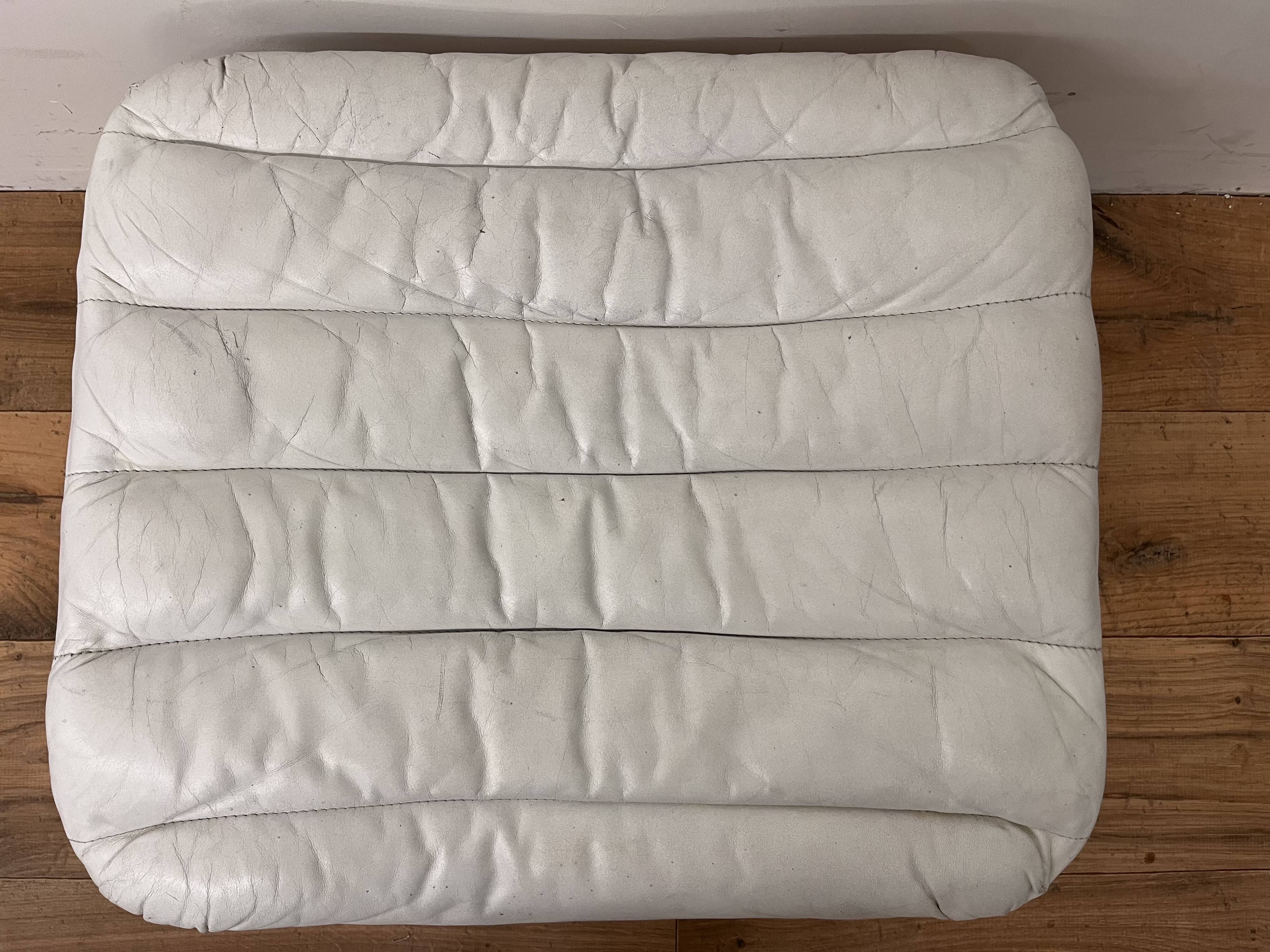 Pulkka armchair by Ilmaria Lappalainen and its ottoman