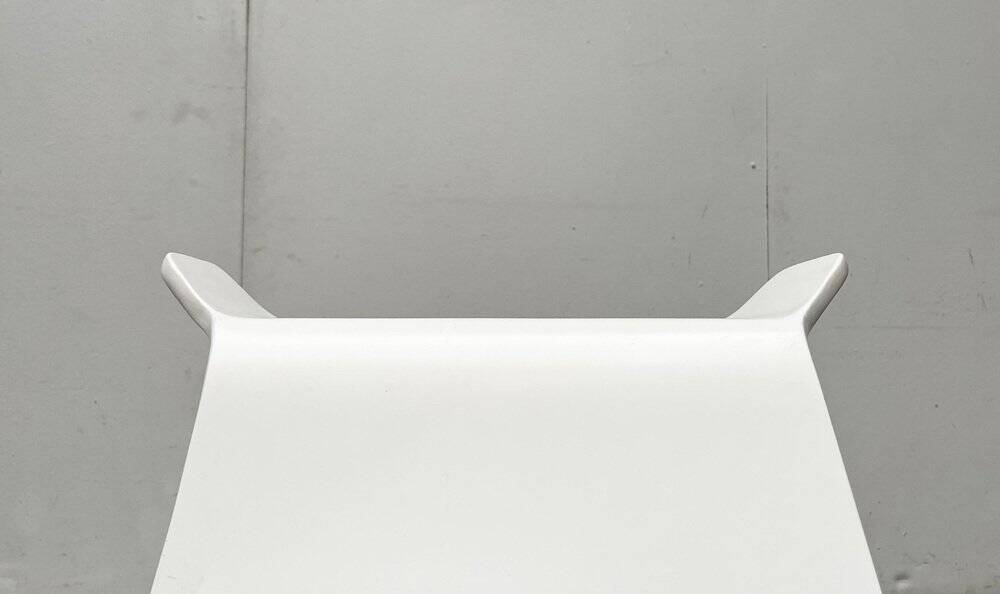 Minimalist Danish rocking stool by Michael C. Poulsen