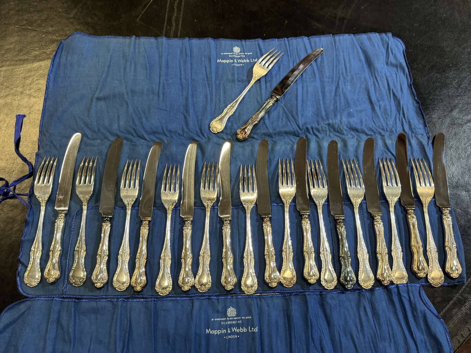 Set of 12 knives and 12 forks by Mappin and Webb in silver-plated metal.