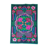 Handwoven colorful Romanian carpet, green and black background with gorgeous colorful flowers