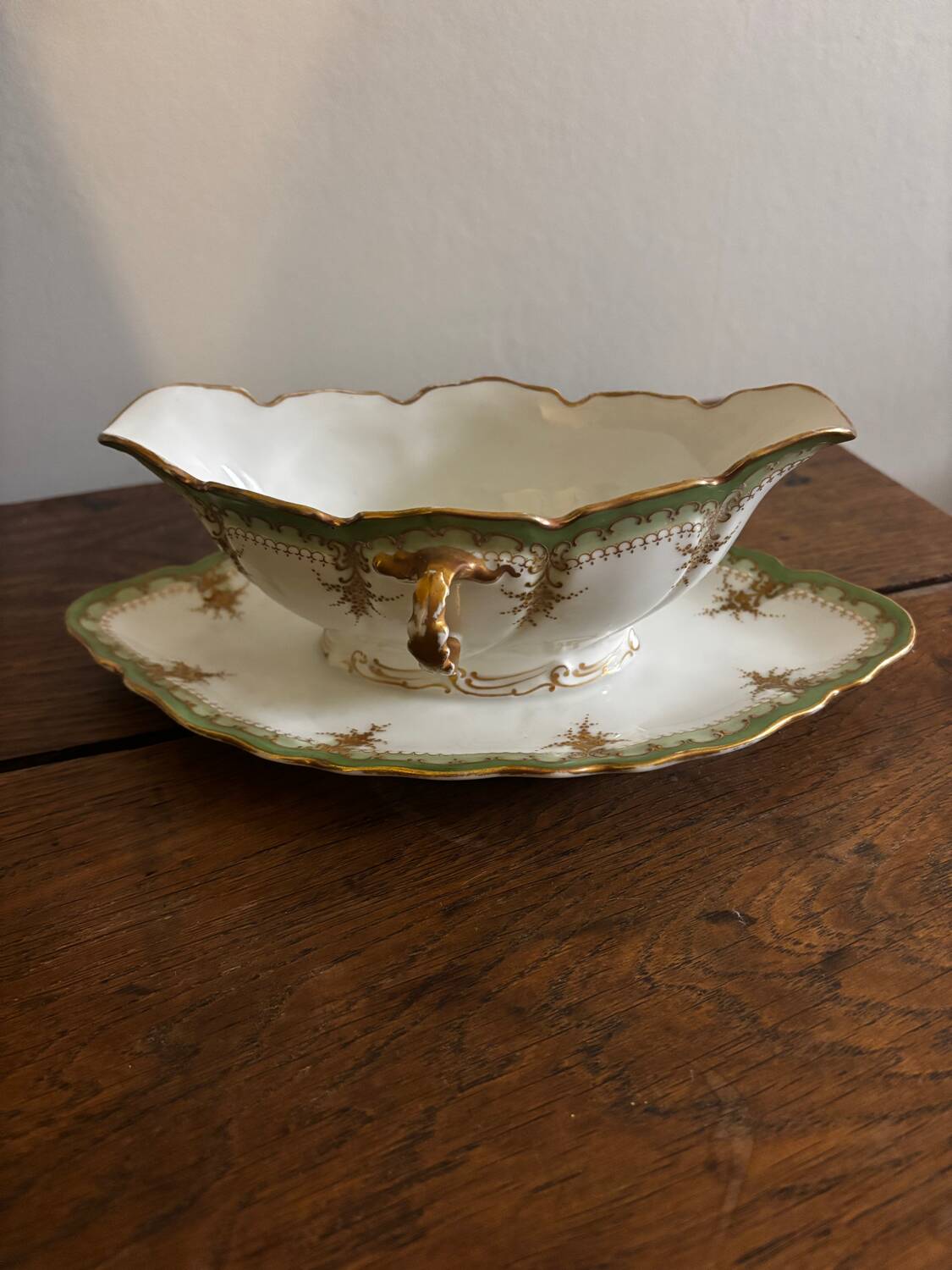 Vintage green Limoges porcelain gravy boat with gilt trim
