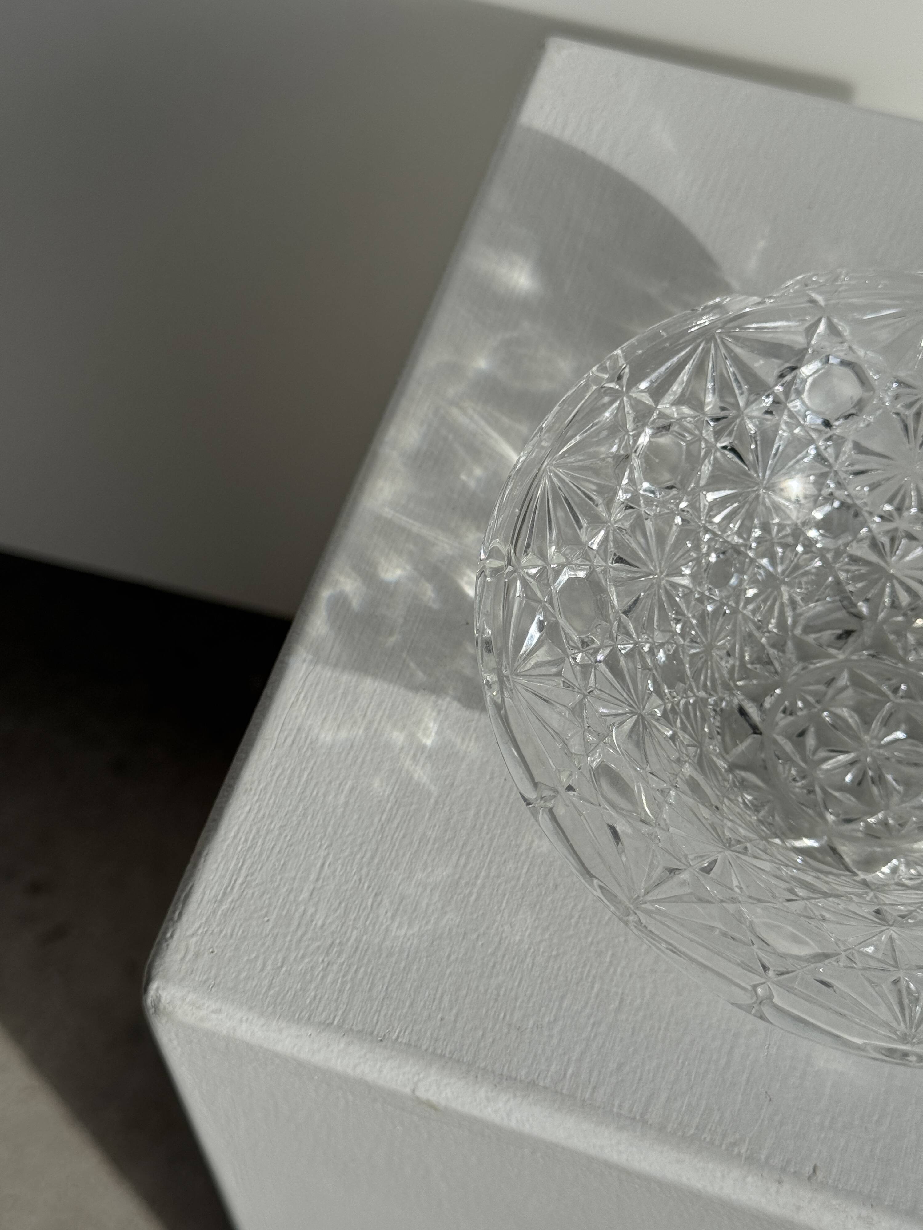 Small glass dish with vintage diamond points, a sparkle.