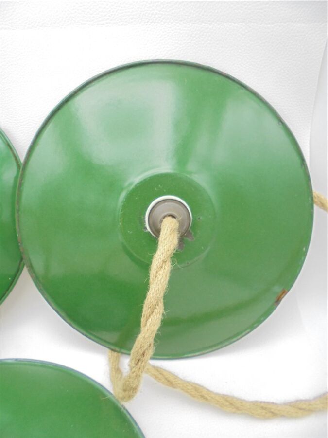 Trio of enamelled sheet metal suspensions