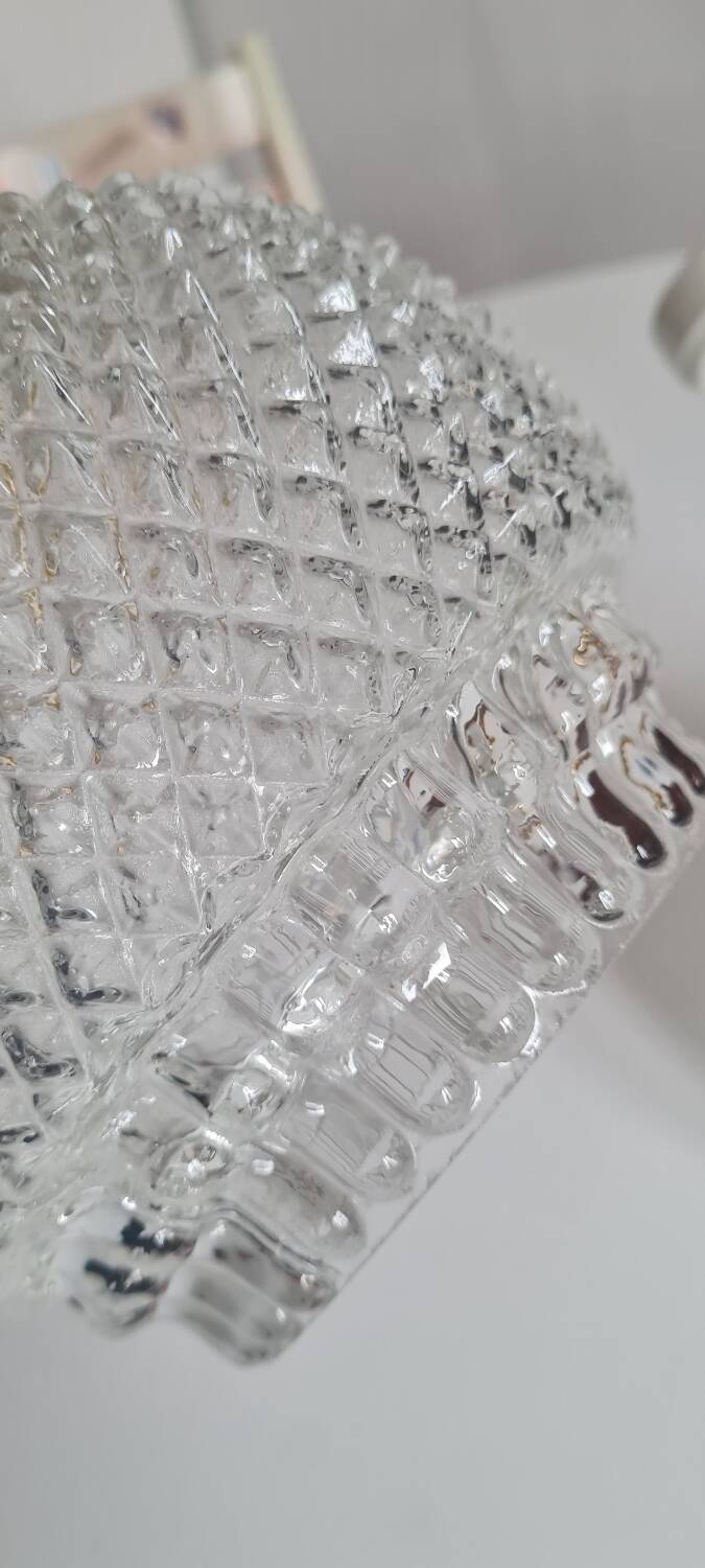 Pair of chiseled glass sconces