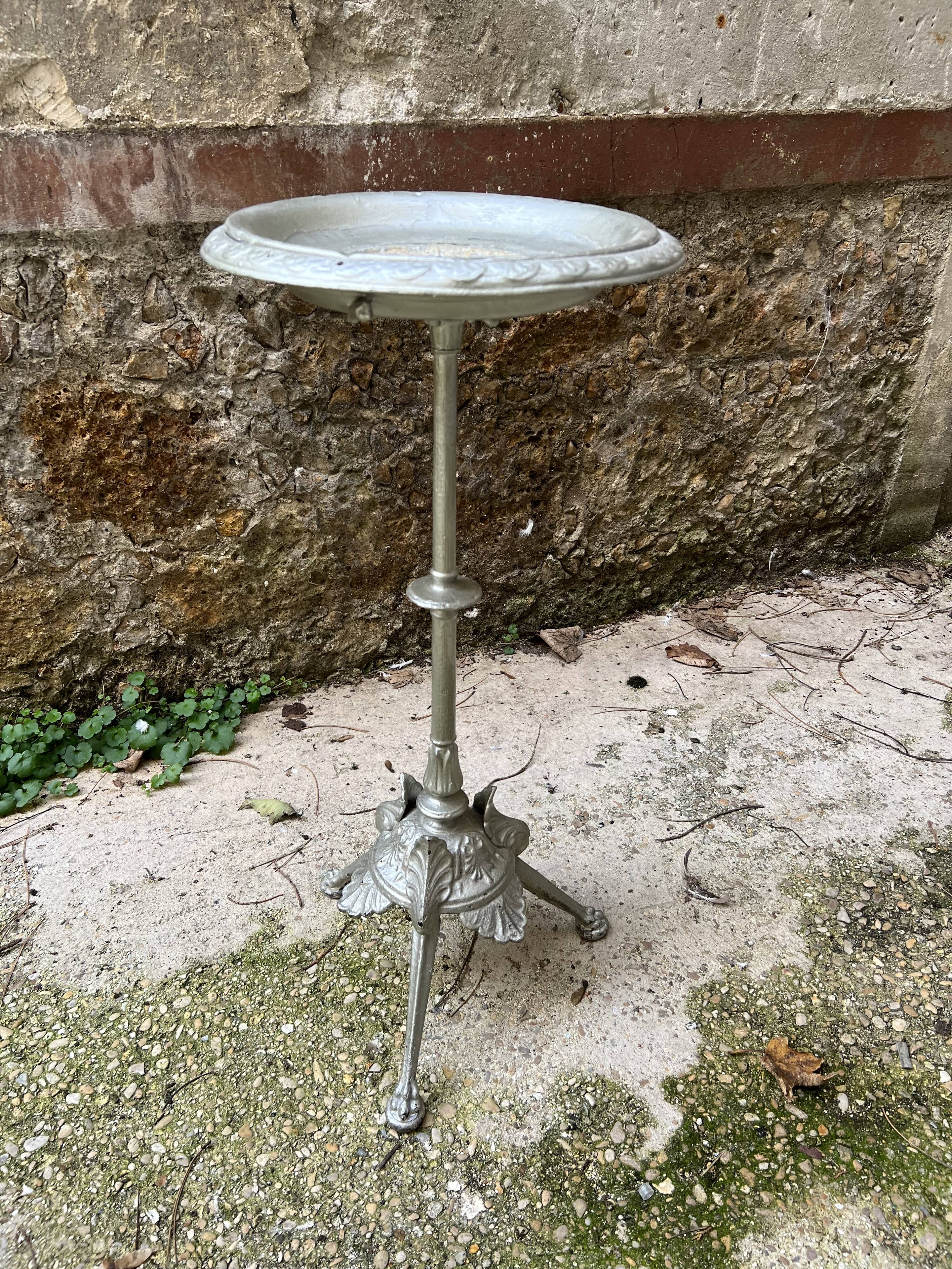 Side table pedestal table with silver cast iron plant