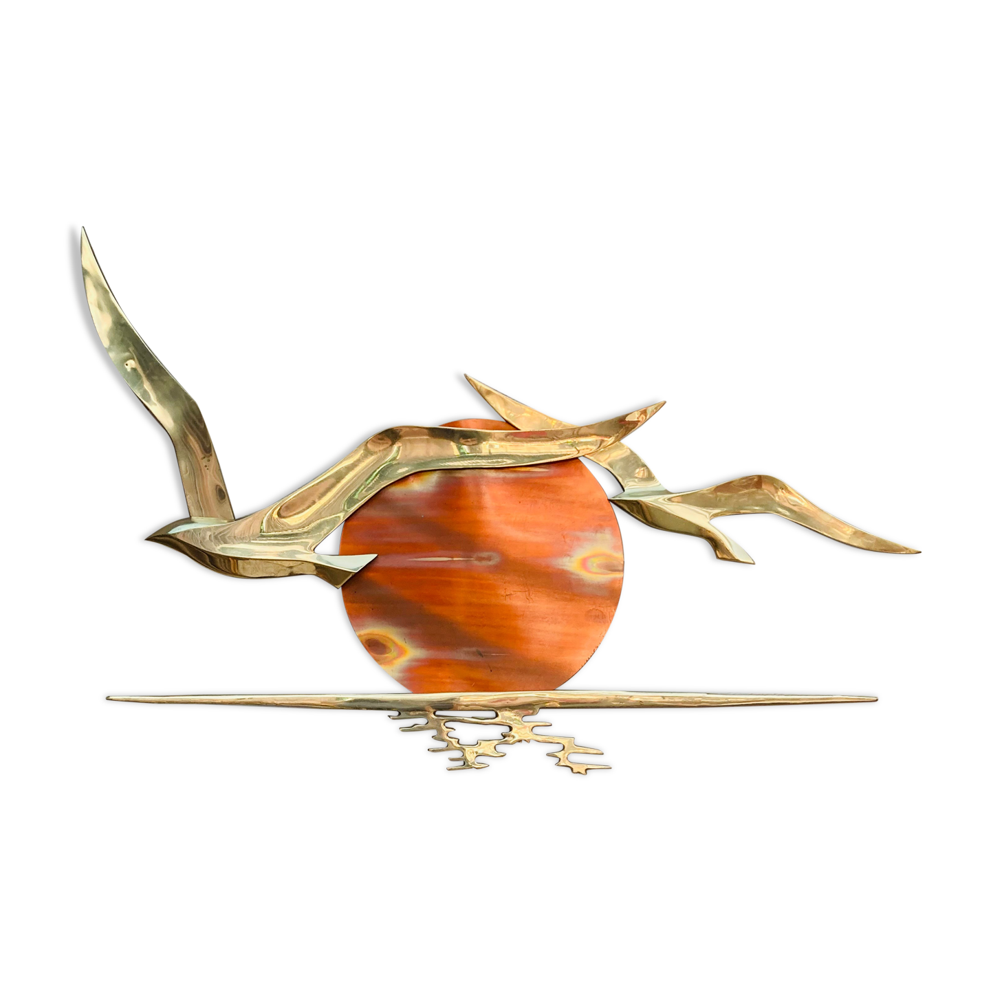 Bird brass and sun bronze wall decoration
