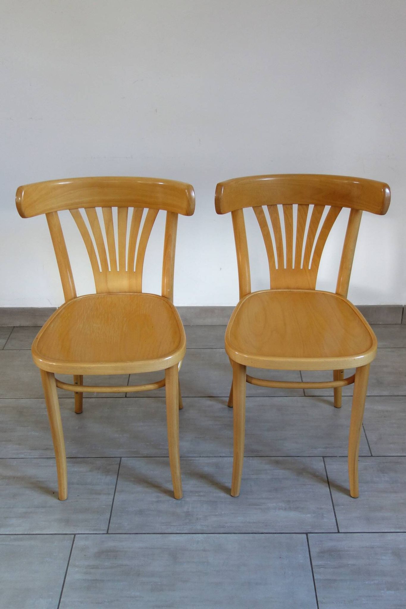 Pair of Thonet-inspired bistro chairs in light beech
