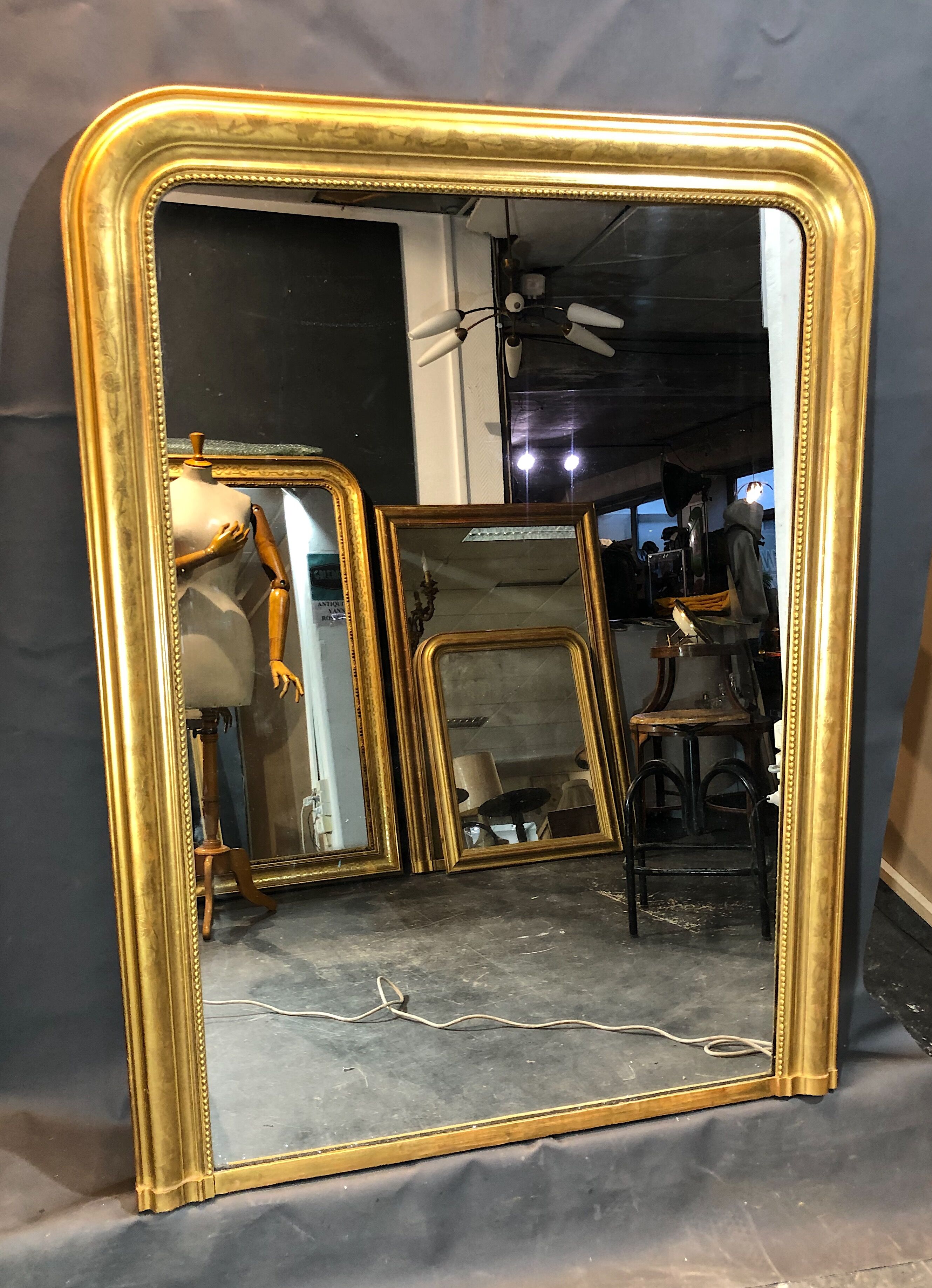 Old mirror 133x100cm gilded with gold leaf