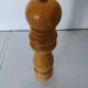 Turned wooden pepper mill