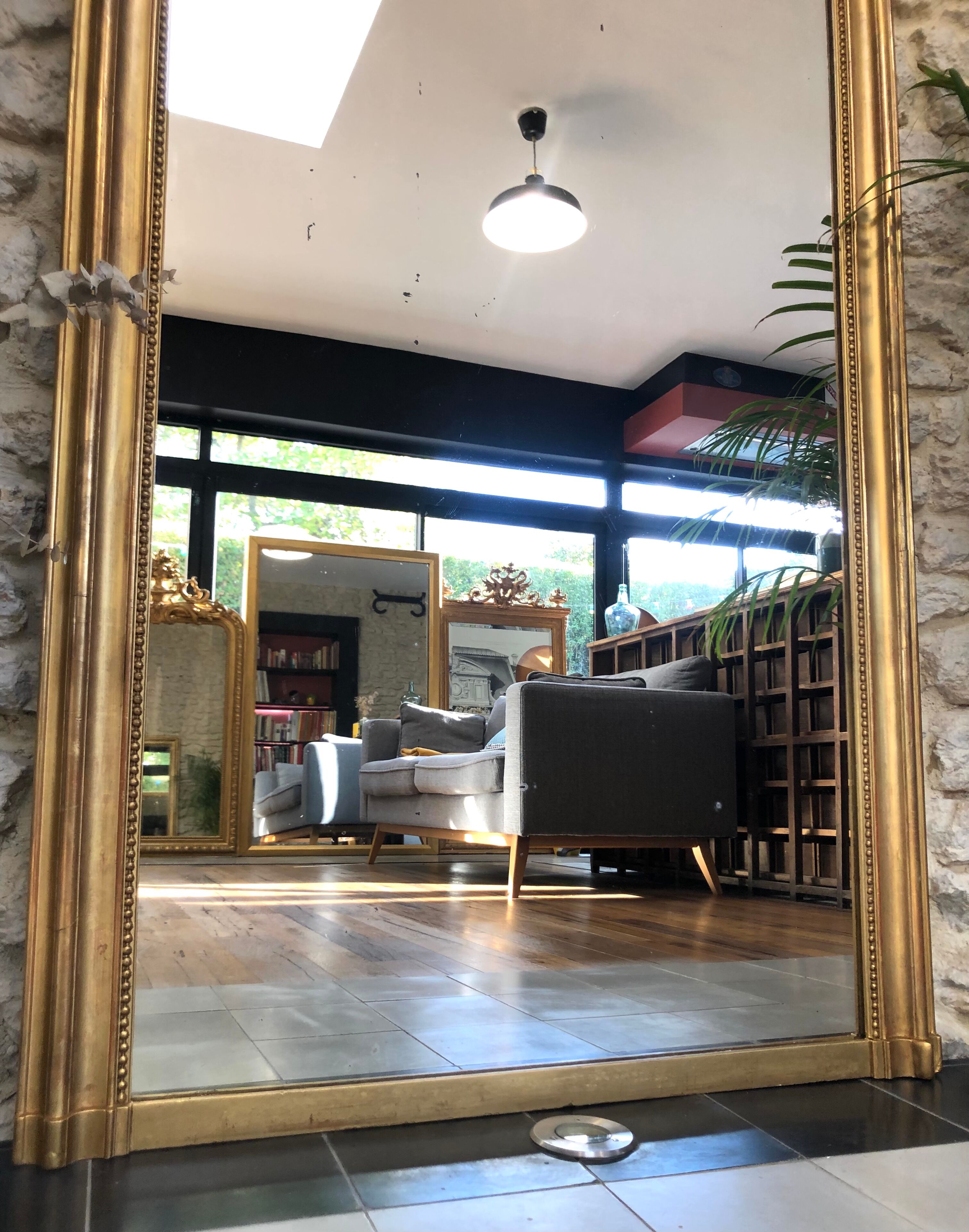 Old fireplace mirror 144cm/97.5cm, pearled, late 19th century, gilded with pricked ice leaf.