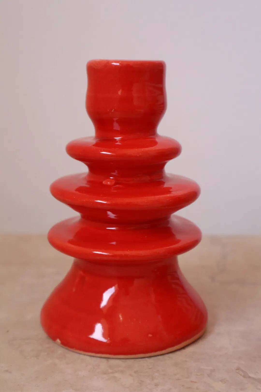 Pair of colorful poppy red ceramic candle holders