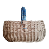 Basket with rattan handle and blue thread